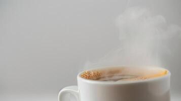 Coffee Cup, A close-up shot of a steaming cup of coffee, isolated on a white background photo