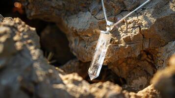 Silver Crystal Pendant Necklace in Natural Setting photo