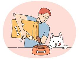 Smiling man give food from package to dog vector