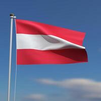 Austria Flag is waving in front of a blue sky with blurred clouds in the background photo