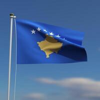 Kosovo bandera es ondulación en frente de un azul cielo con borroso nubes en el antecedentes foto