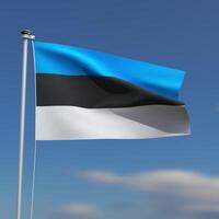 Estonia Flag is waving in front of a blue sky with blurred clouds in the background photo