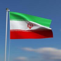 Iran Flag is waving in front of a blue sky with blurred clouds in the background photo