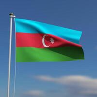 Azerbaijan Flag is waving in front of a blue sky with blurred clouds in the background photo