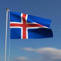 Iceland Flag is waving in front of a blue sky with blurred clouds in the background photo