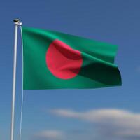 Bangladesh Flag is waving in front of a blue sky with blurred clouds in the background photo