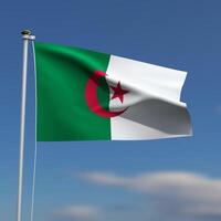 Algeria Flag is waving in front of a blue sky with blurred clouds in the background photo