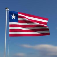 Liberia Flag is waving in front of a blue sky with blurred clouds in the background photo