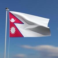 Nepal Flag is waving in front of a blue sky with blurred clouds in the background photo