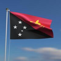 Papua New Guinea Flag is waving in front of a blue sky with blurred clouds in the background photo