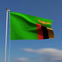 Zambia Flag is waving in front of a blue sky with blurred clouds in the background photo