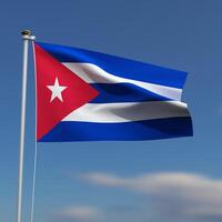 Cuba Flag is waving in front of a blue sky with blurred clouds in the background photo