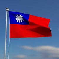 Taiwan Flag is waving in front of a blue sky with blurred clouds in the background photo