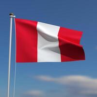 Peru Flag is waving in front of a blue sky with blurred clouds in the background photo