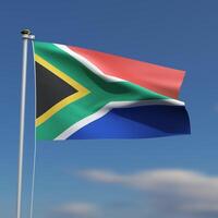 South Africa Flag is waving in front of a blue sky with blurred clouds in the background photo