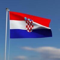 Croatia Flag is waving in front of a blue sky with blurred clouds in the background photo