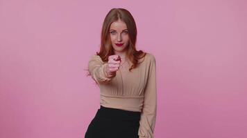 Greedy businesswoman showing fig gesture, you dont get it anyway, refusal fig sign, pink background video