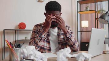 Angry furious man working at home office throwing crumpled paper, having nervous breakdown at work video