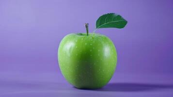 Fresh ripe green apple in purple background photo