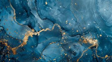 Abstract blue marble texture with gold splashes, blue luxury background. photo