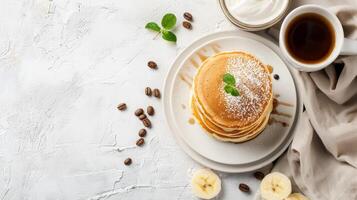 Rustic Cafe Morning Breakfast Coffee and Pancakes, Table Backdrop Background Neutral Minimalist Simple Minimal Color, Beige, Tan, White photo