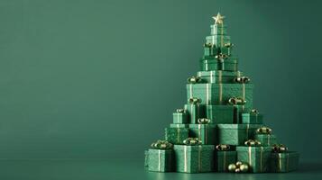 Green christmas presents and gifts stacked into a festive christmas tree shape. photo