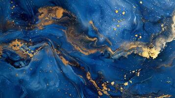 Abstract blue marble texture with gold splashes, blue luxury background. photo