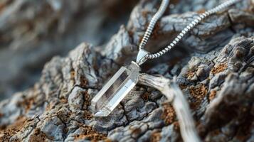 Silver Crystal Pendant Necklace in Natural Setting photo