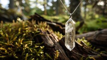 Silver Crystal Pendant Necklace in Natural Setting photo