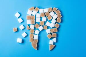 A tooth is made out of sugar cubes photo