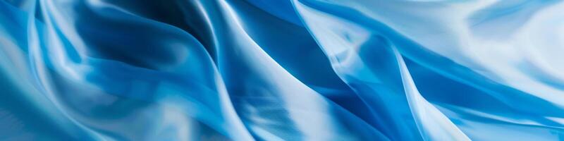 Smooth Flowing Ribbon of Blue Silk Gently Undulating photo