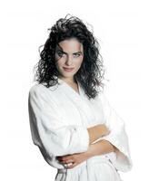 young model with wet hair talking on the phone photo