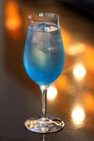 Tequila Blue, drink with tequila, blue curacao, sugar and lemon juice photo