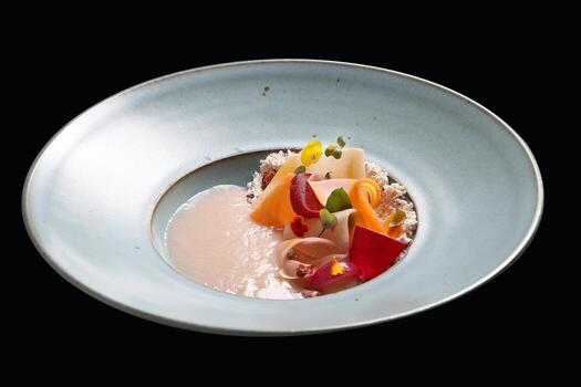 cold cocoa soup with pickles, honey and cocoa nibs photo