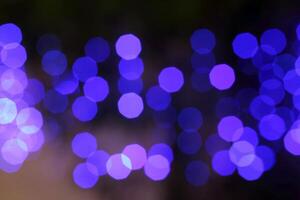 colorful and defocused lights on black background photo