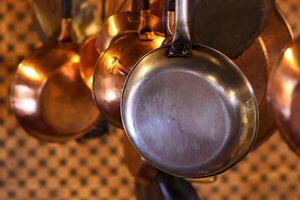 pans hanging in Minas Gerais kitchen photo