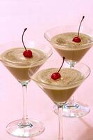 chocolate mousse with cherry in a glass photo