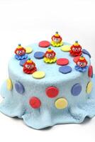 colorful and decorated cake for children's party photo