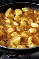 Tarte tartin with plates and cutlery on the table photo
