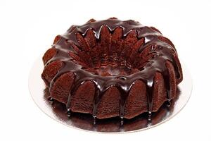 chocolate cake with chocolate syrup icing photo