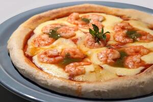 shrimp pizza with cheese and tomato sauce photo