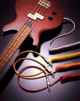 double bass, musical instrument with colorful cables on neutral background photo