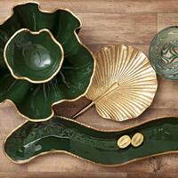 assembly of wooden cups, plates and platters with various fruits and vegetables seen from above photo