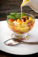 fruit salad with orange juice photo