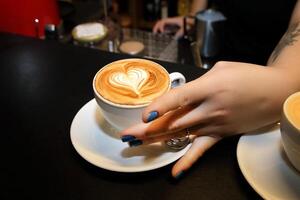 professional barista serving a special espresso photo