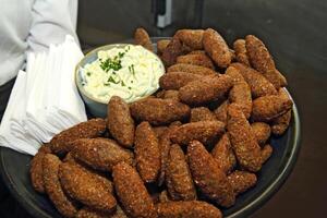 delicious fried kibbeh on a tray photo