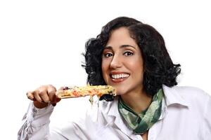 smiling brunette model with her piece of pizza photo