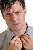 young man with beard in different situations on neutral background photo