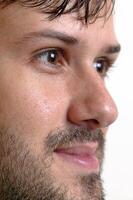 young man with beard in different situations on neutral background photo