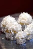 vanilla cupcakes with grated coconut photo